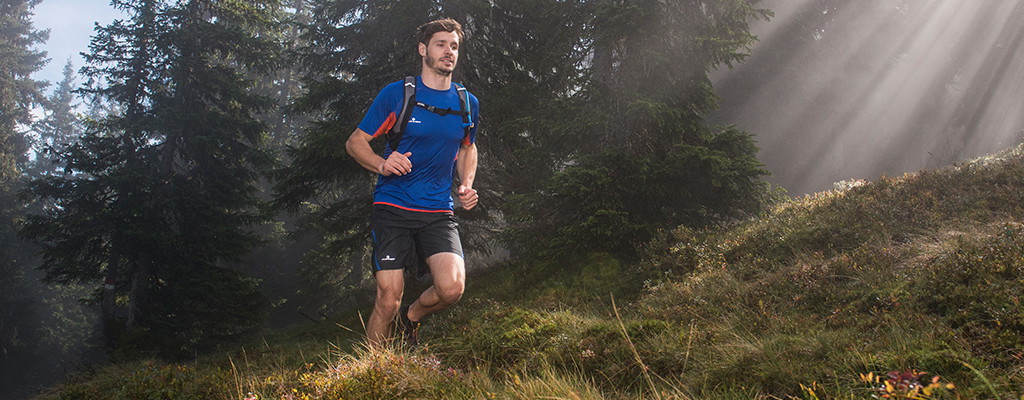 man running wearing quick dry clothing