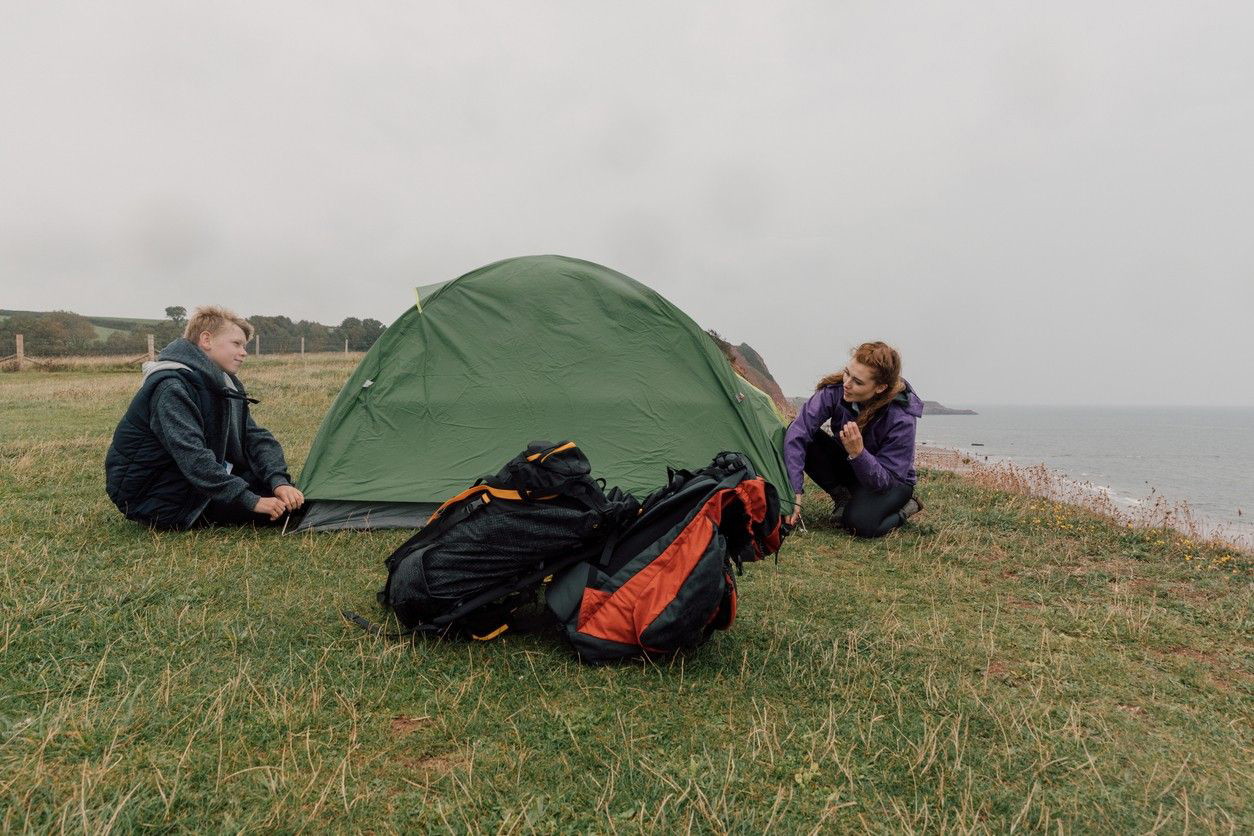 Young people near their tent