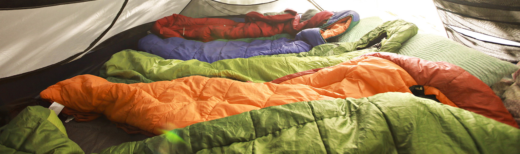 Many sleeping bags next to each other
