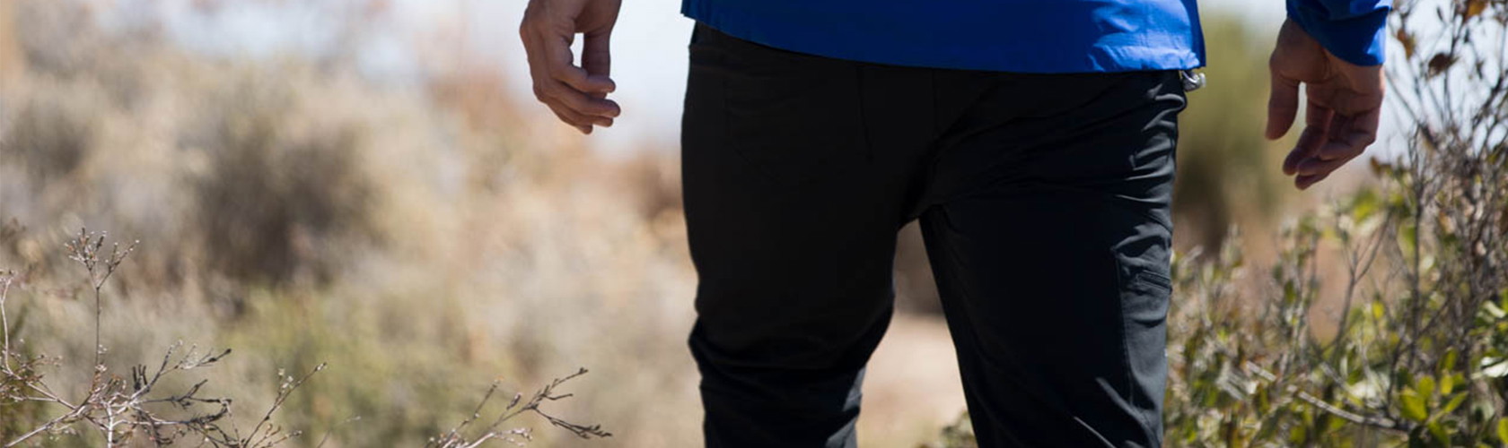 A person wearing walking trousers 